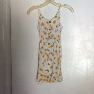 White floral dress; yellow flowers